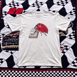 Ladybug And Book Graphic Tee In White And Red Tees